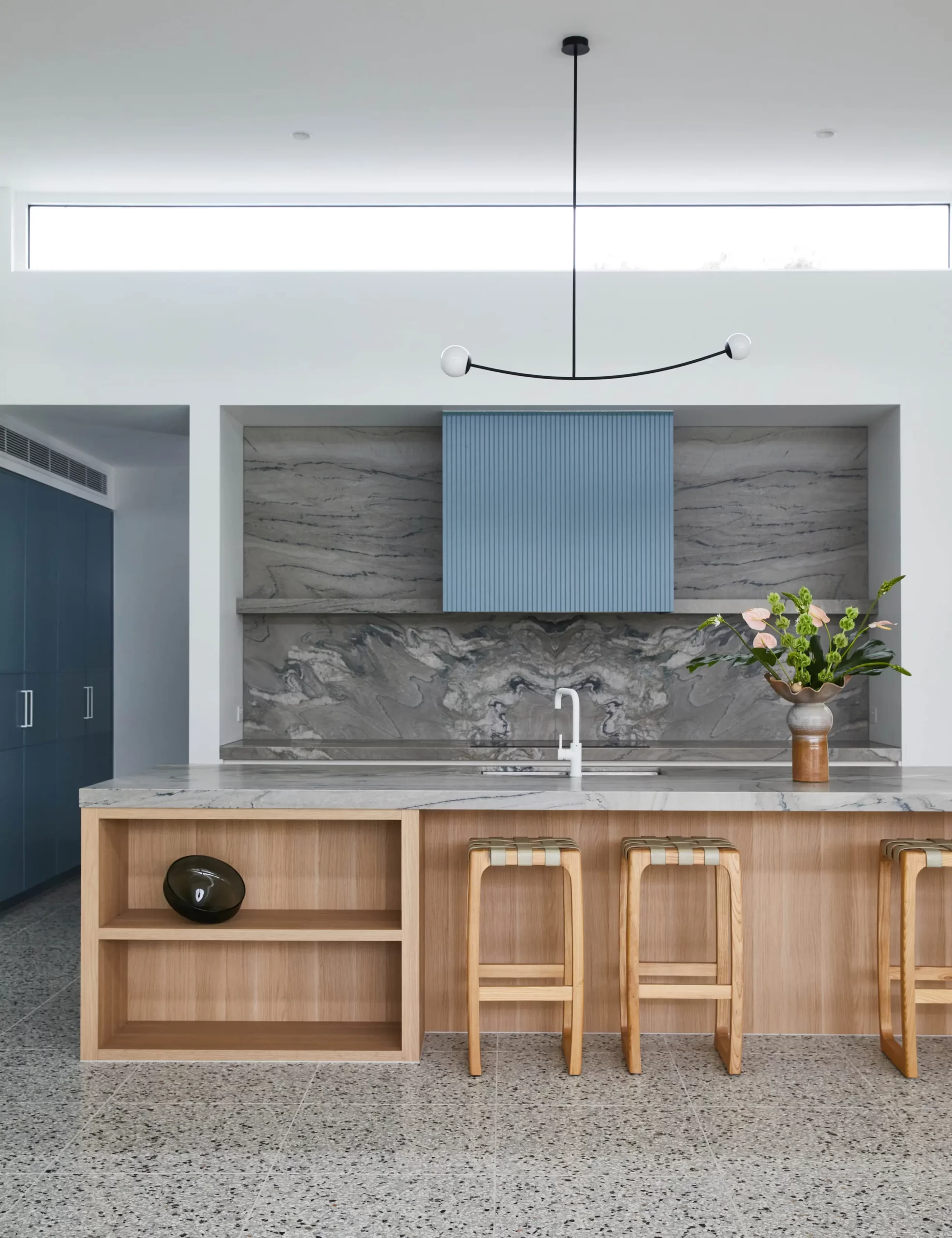 Mid century modern kitchen blue and white, terrazzo flooring